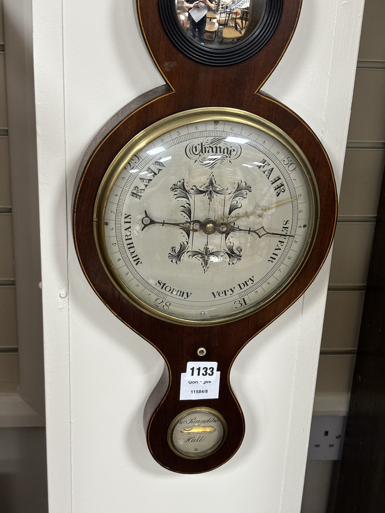 An early 19th century mahogany wheel barometer by Reynoldson of Hull, height 96cm